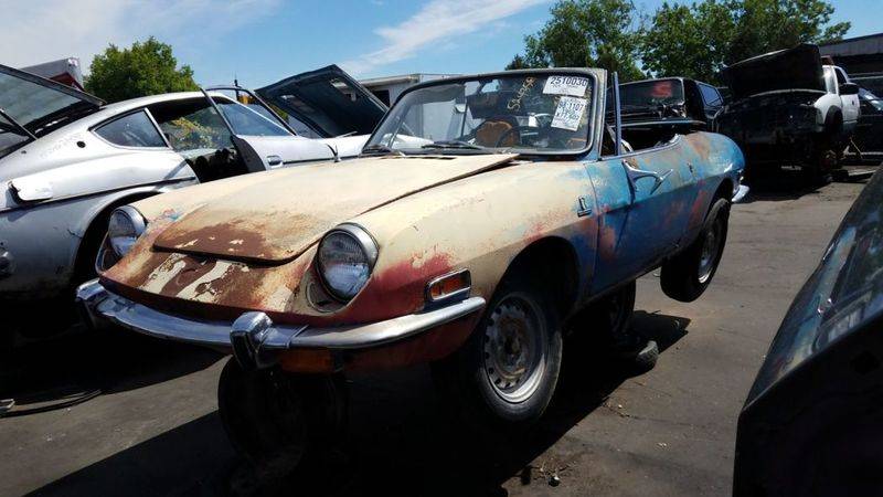 00-1969-fiat-850-spider-in-colorado-wrecking-yard-photo-by-m-1.jpg