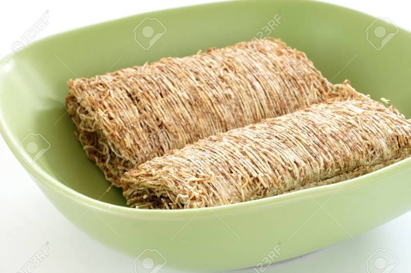 23894129-shredded-wheat-biscuits-in-close-up.jpg