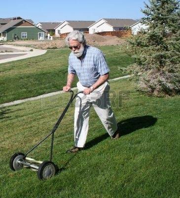 443653-senior-man-mowing-lawn-with-manual-reel-type-mower.jpg