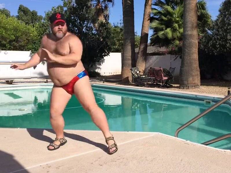 fat-guy-by-pool.jpg