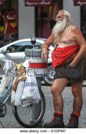 funny-old-man-summary-dressed-in-leather-pants-drink-a-glass-of-beer-g1dpm7.jpg