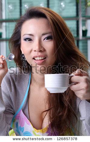 stock-photo-beautiful-young-sexy-woman-drinks-hot-coffee-at-home-126857378.jpg