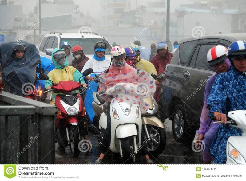 wind-ho-chi-minh-city-viet-nam-nov-group-asian-people-wear-raincoat-difficult-move-bad-104448052.jpg