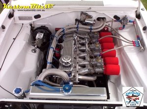 Chryslers-By-the-Bay-2009-Chrysler-Valiant-VG-Sedan-white-265-Hemi-engine-bay.jpg